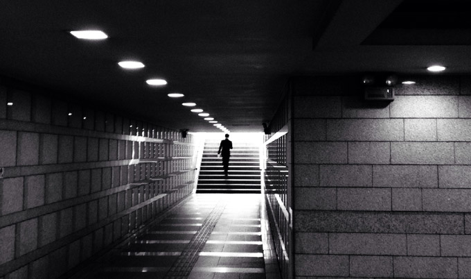 Man walking in underground passage