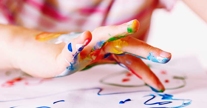 A child drawing and painting