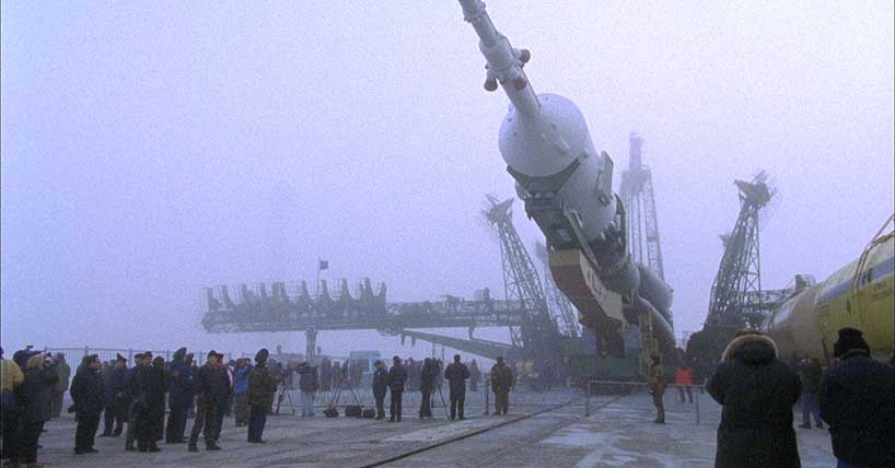 The image shows a rocket at the Baikonur Cosmodrome in Kazakhstan. The image shows a rocket at the Baikonur Cosmodrome in Kazakhstan.